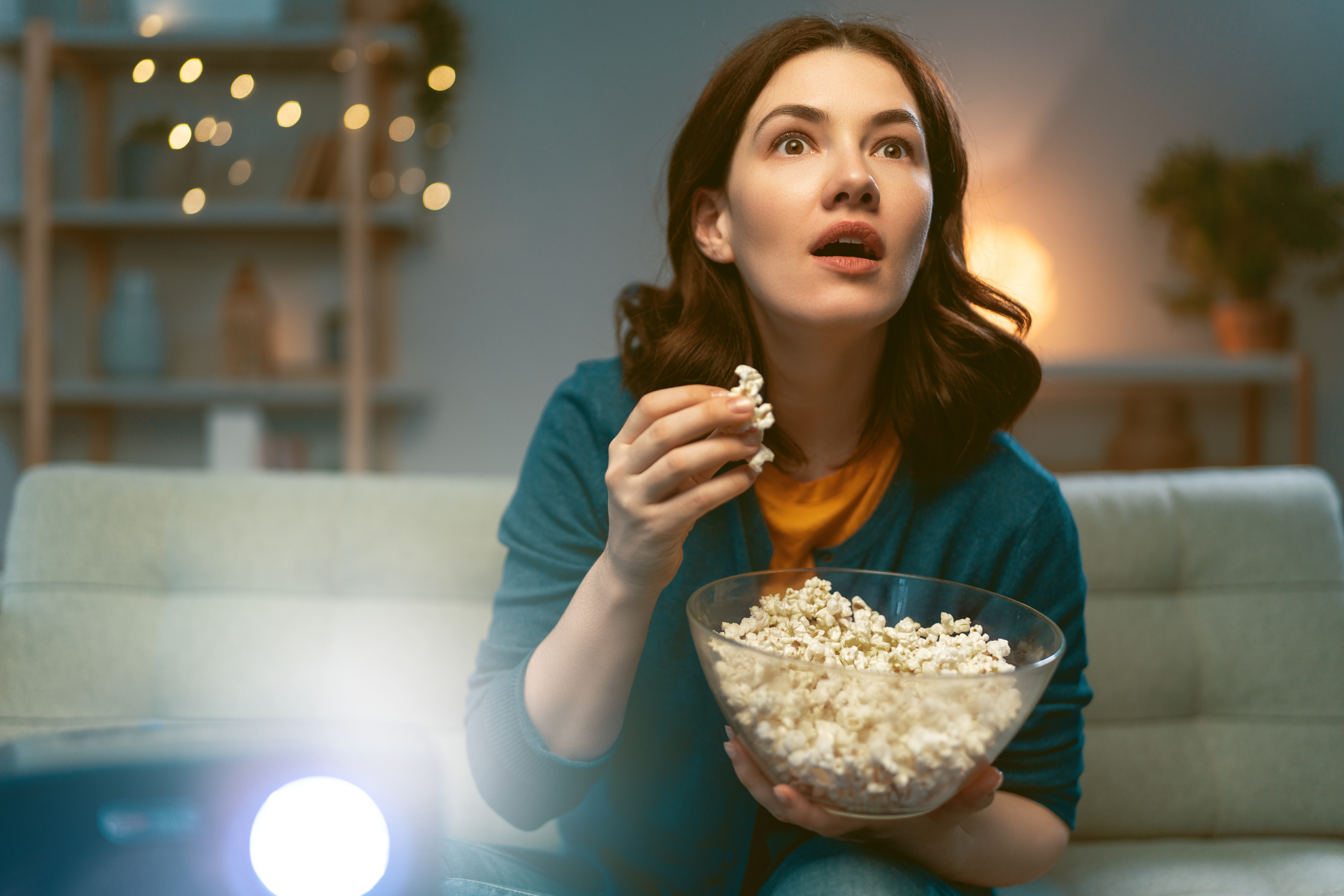 Woman Watching Movie with Projector