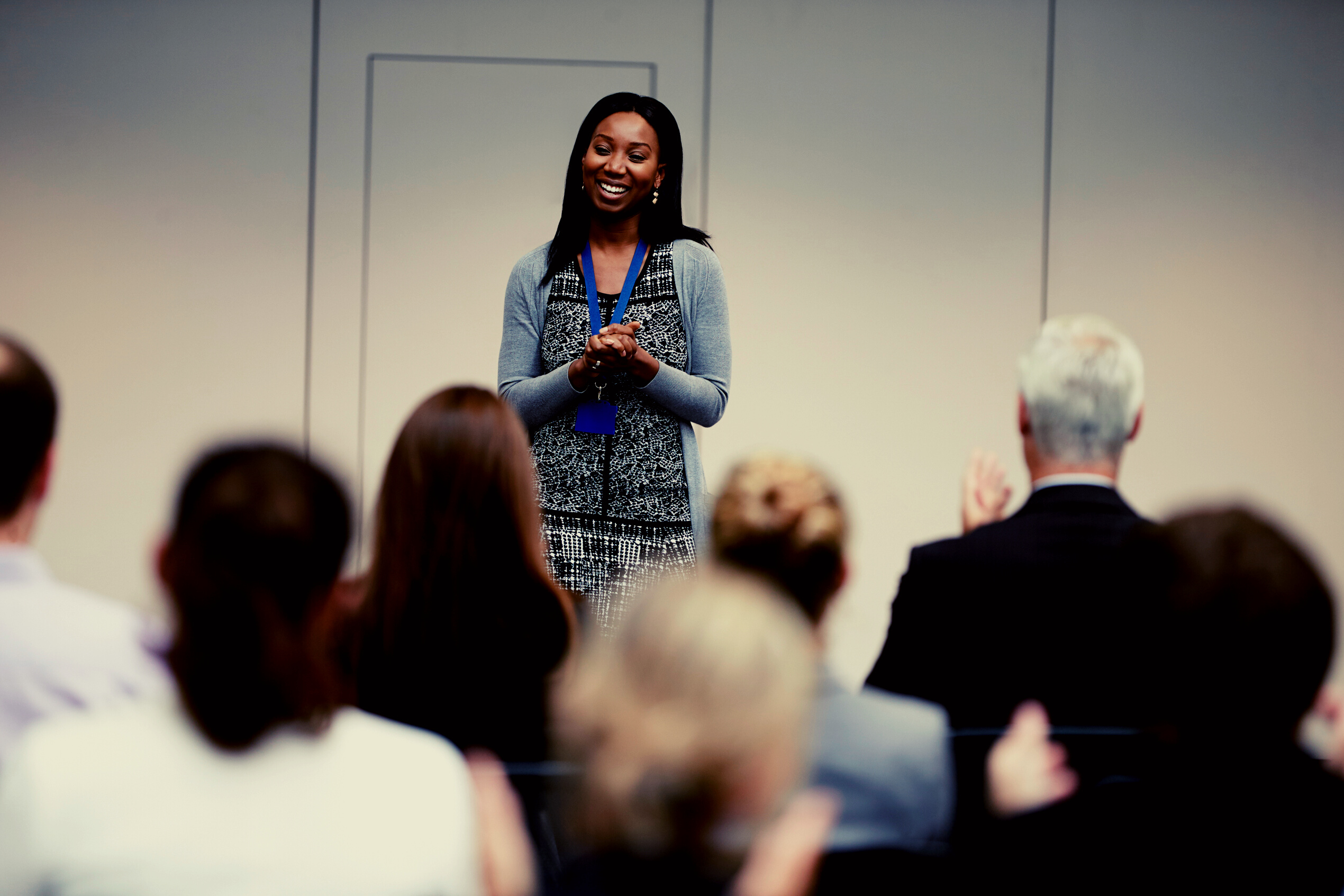 Audience Applauding Speaker after Conference Presentation