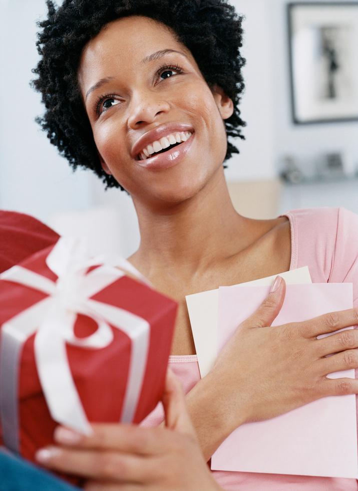 Woman Receiving a Gift and Card